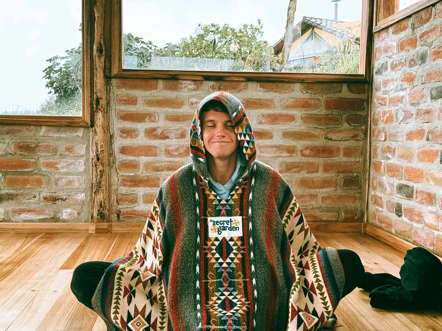 secret garden cotopaxi sam in poncho