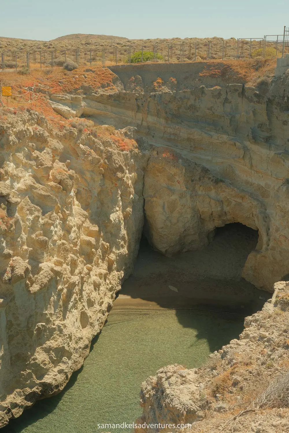 things to do in milos cave and beach below