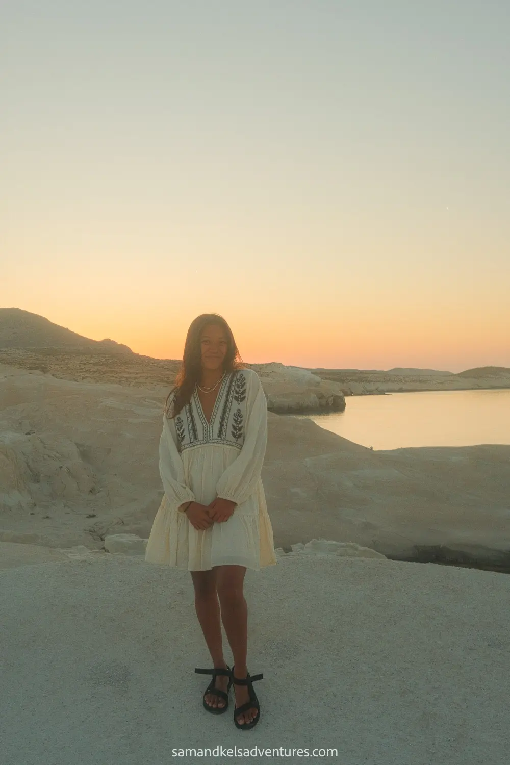 things to do in milos sunset pic white dress