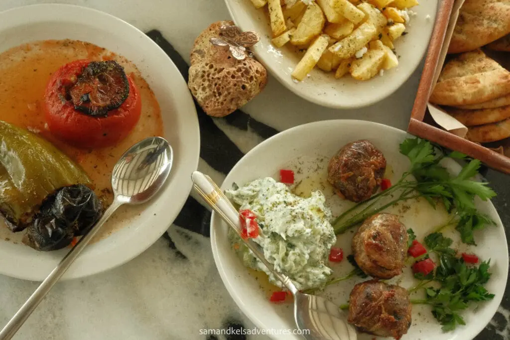 greece island hopping itinerary meatballs peppers fries and tzatziki  